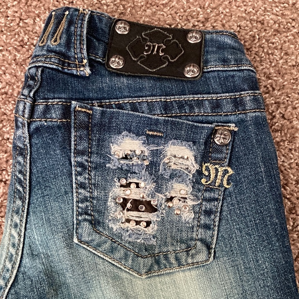 Miss Me Distressed, Cut Capri Jeans with Unique Embellished Detailing